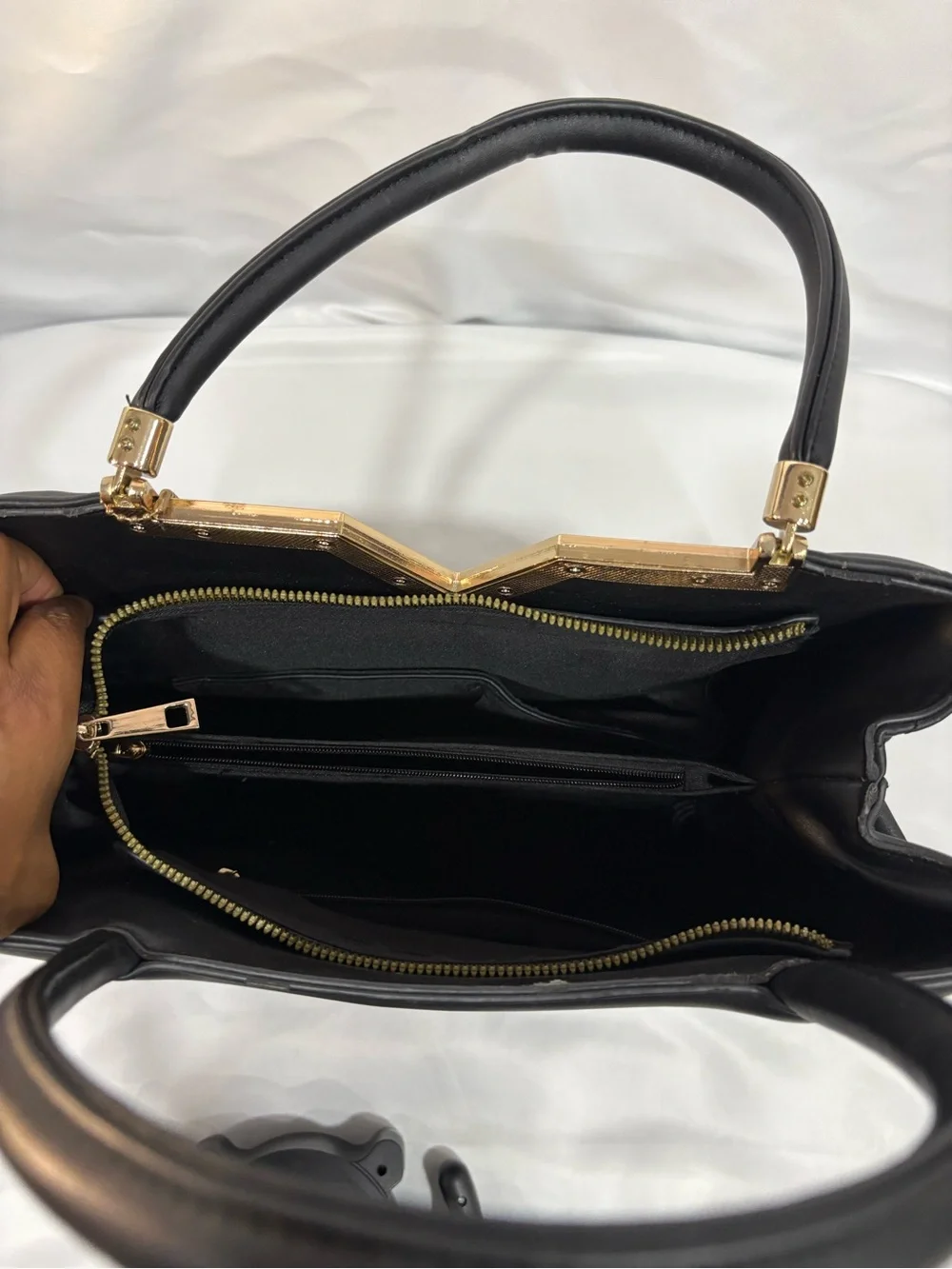 Quilted Black Tote with Gold V Accent and Tassel Charm